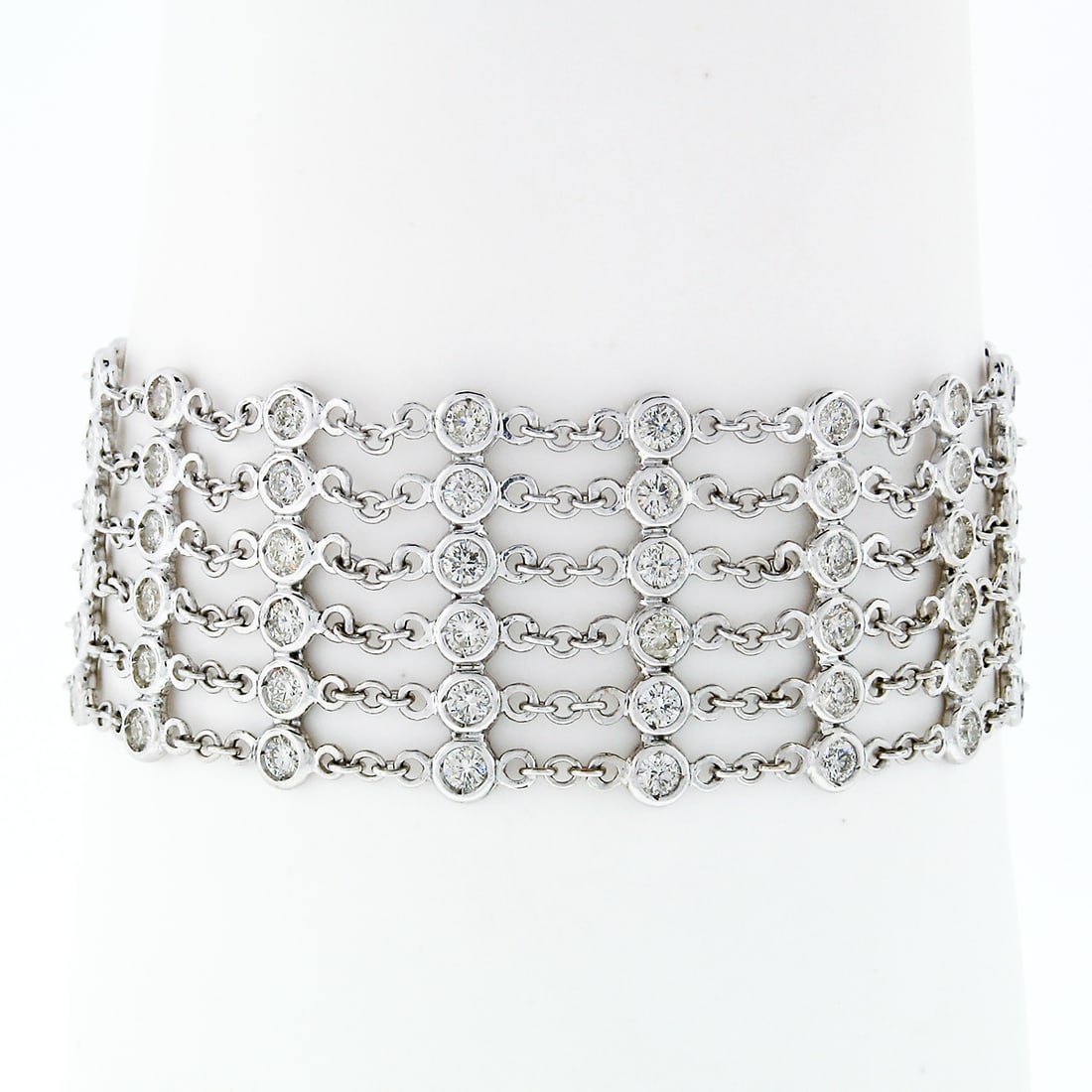 18k White Gold 6.65ct Diamond and Sapphire 6 Row Bracelet: 18k White Gold 6.65ct Diamond and Sapphire 6 Row Bracelet This stunning 18k White Gold "By the Yard" Bracelet features an impressive total carat weight of 6.65ct, showcasing 90 round brilliant cut dia