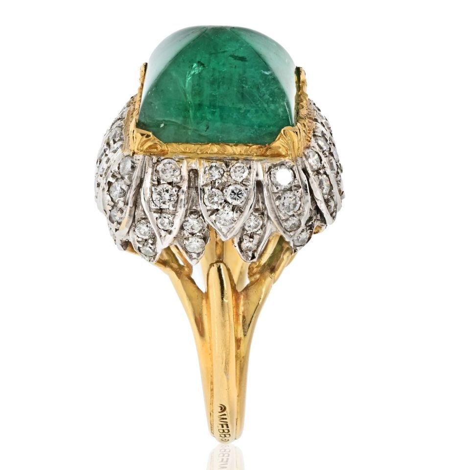 David Webb 1960s Platinum 18K Yellow Gold Emerald Sugarloaf Ring: David Webb 1960s Platinum 18K Yellow Gold Emerald Sugarloaf Ring This exquisite estate ring features a stunning green emerald in a sugarloaf cut, complemented by round cut diamonds set in a platinum c