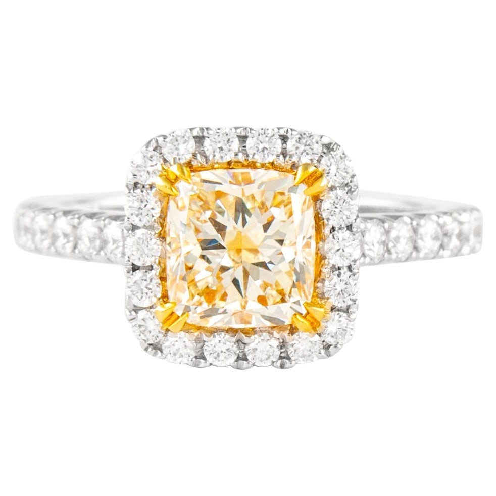 2.27ct Fancy Light Yellow VVS2 Diamond Ring 18k Gold: 2.27ct Fancy Light Yellow VVS2 Diamond Ring 18k Gold This exquisite 2.27ctt Fancy Light Yellow Cushion VVS2 Diamond Ring is a modern masterpiece crafted in two-tone 18k yellow and white gold. The ring