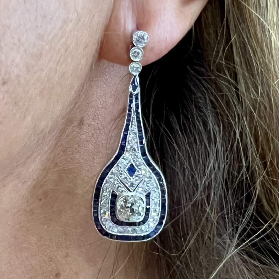 Deco Style Platinum Earrings with Diamonds and Sapphires 4.90 Ct: Deco Style Platinum Earrings with Diamonds and Sapphires 4.90 Ct Exquisite Deco Style Platinum Earrings featuring a stunning combination of Old Mine Diamonds and Sapphires. These earrings weigh 16.7 g