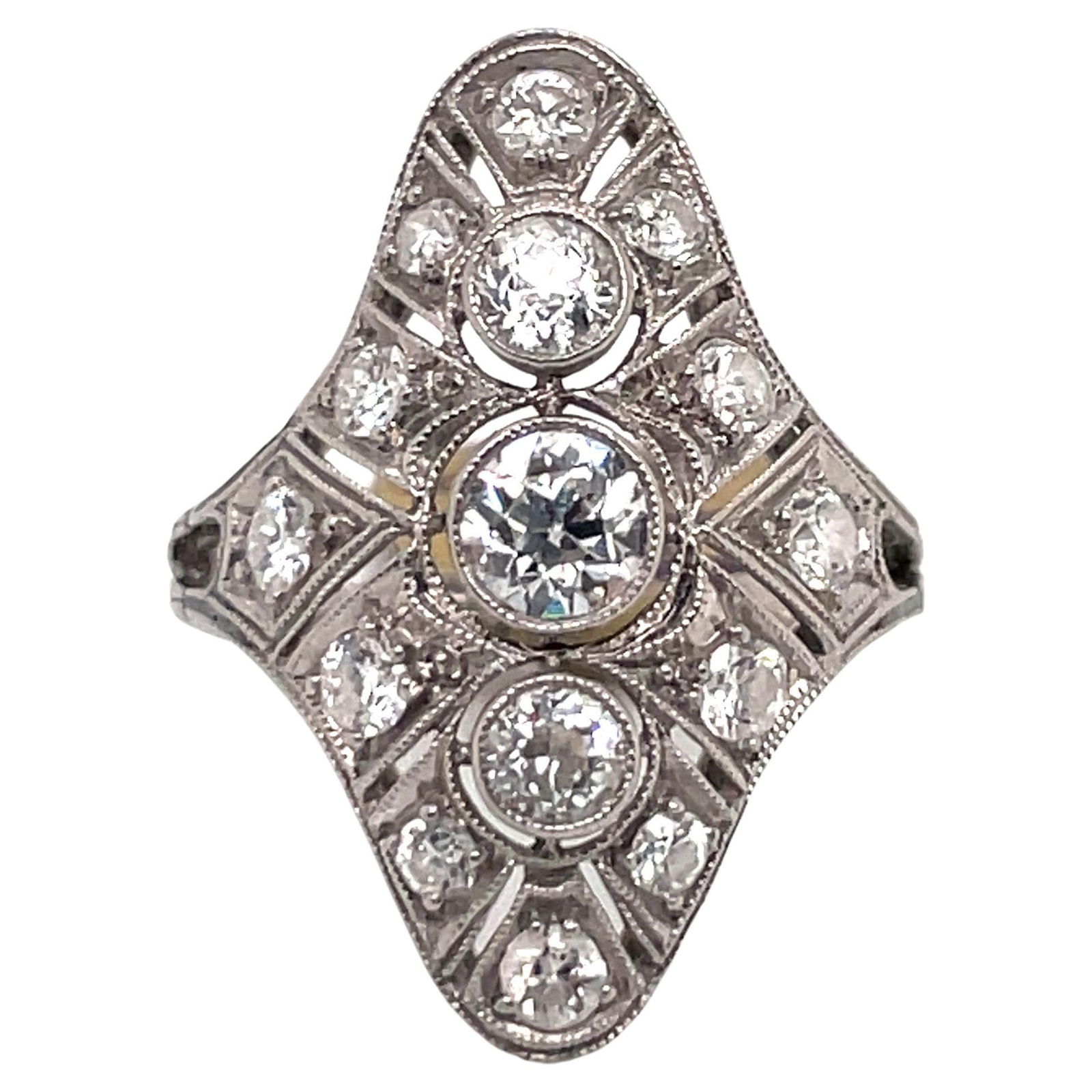 Art Deco Platinum Ring with 3 Round Cut Diamonds 1.20 Carats: Art Deco Platinum Ring with 3 Round Cut Diamonds 1.20 Carats This exquisite Art Deco ring showcases a stunning arrangement of three round-cut diamonds, accentuated by a delicate miligrain design that