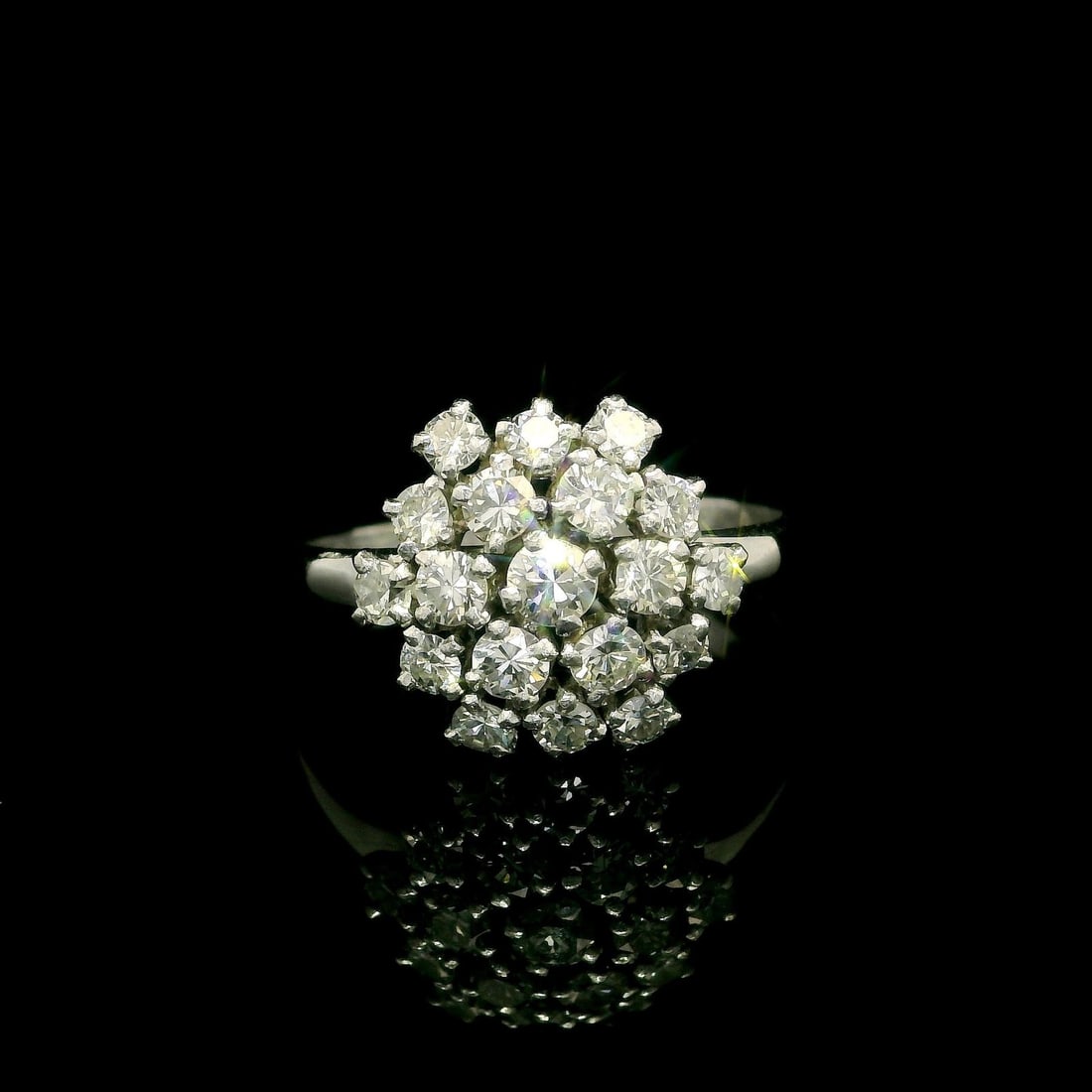 Platinum 0.75ctw Old Cut Diamond Floral Cocktail Ring: Platinum 0.75ctw Old Cut Diamond Floral Cocktail Ring Discover the elegance of this stunning Platinum Low Profile Cluster Floral Snow Flake Ring. Featuring a total carat weight of approximately 0.75ct