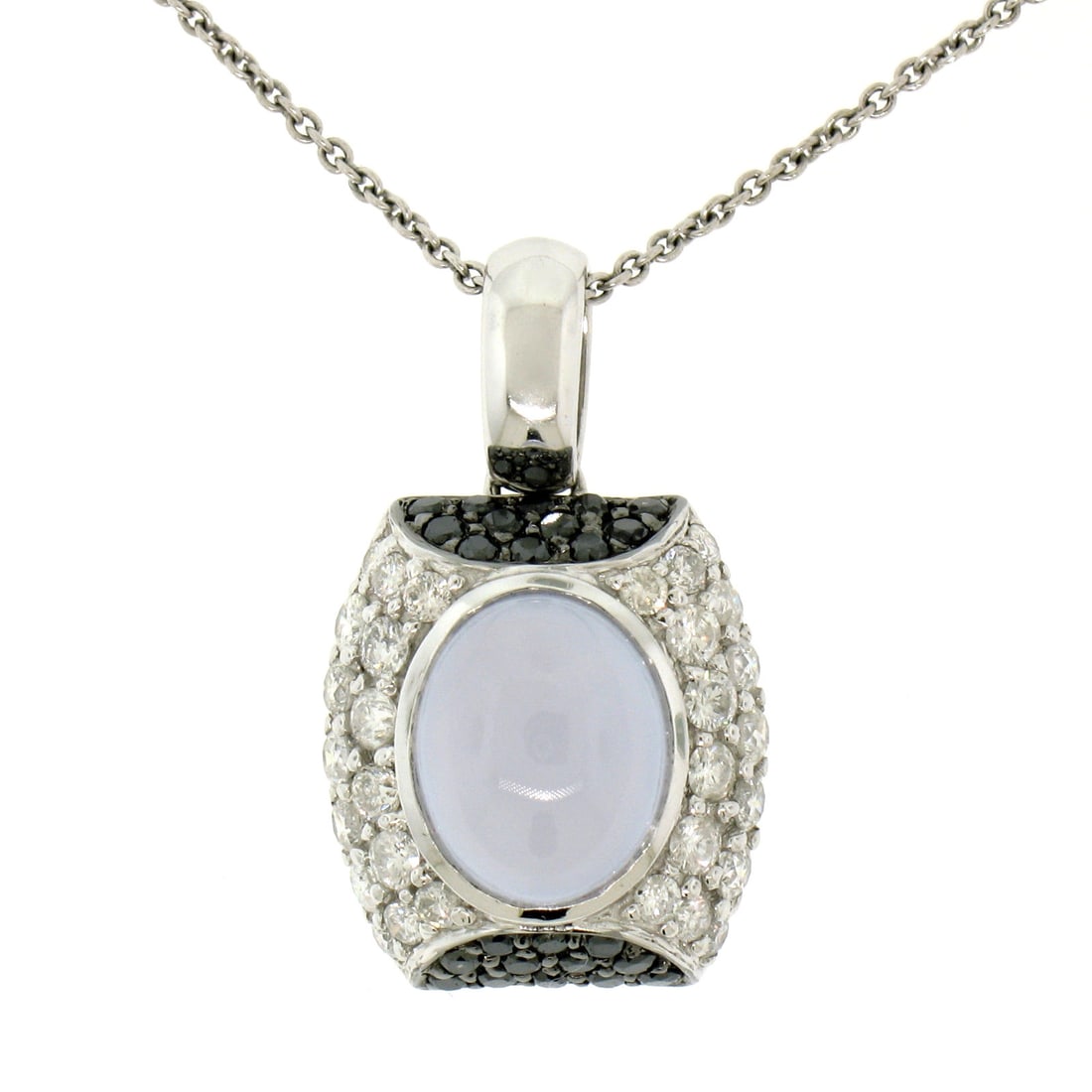 14K White Gold Chalcedony Diamond Pendant Necklace 4.31ct 16 Inch: 14K White Gold Chalcedony Diamond Pendant Necklace 4.31ct 16 Inch Elevate your jewelry collection with this stunning 14K White Gold Pendant Necklace featuring a captivating 4.31ct oval chalcedony cent