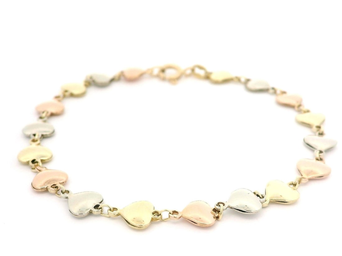 Italian 14k Gold Tri-Color Polished 7" Heart Link Bracelet: Italian 14k Gold Tri-Color Polished 7" Heart Link Bracelet This exquisite Italian solid 14k gold tri-color polished stackable heart link bracelet is a stunning addition to any jewelry collection. Craf