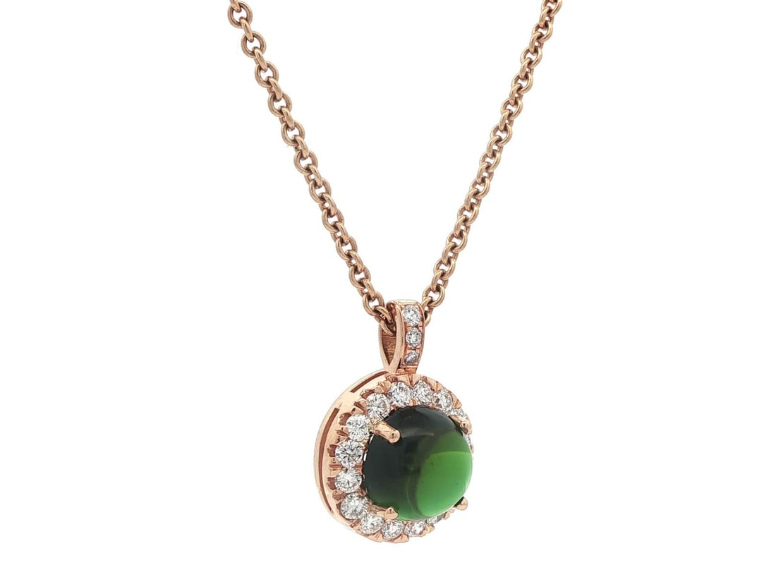 Rosy Yellow Gold Green Tourmaline Diamond Halo Pendant Necklace: Rosy Yellow Gold Green Tourmaline Diamond Halo Pendant Necklace This exquisite pendant necklace features a stunning natural green tourmaline center stone surrounded by a halo of sparkling diamonds. Th