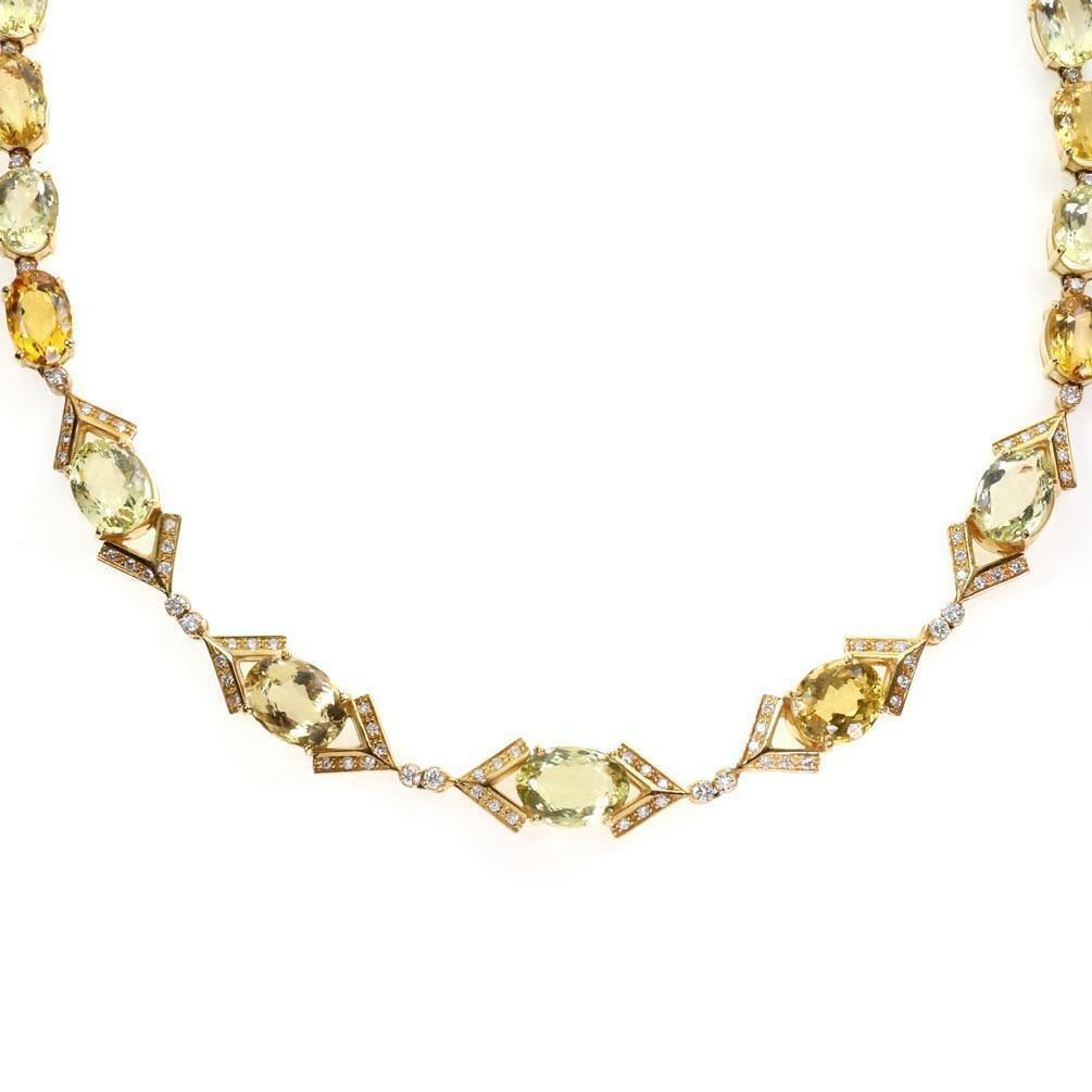 Elegant 18k Yellow Gold Citrine Diamond Necklace Estate Jewelry: Elegant 18k Yellow Gold Citrine Diamond Necklace Estate Jewelry This exquisite estate necklace features a captivating design crafted from 18k yellow gold. The centerpiece showcases V-shaped links that