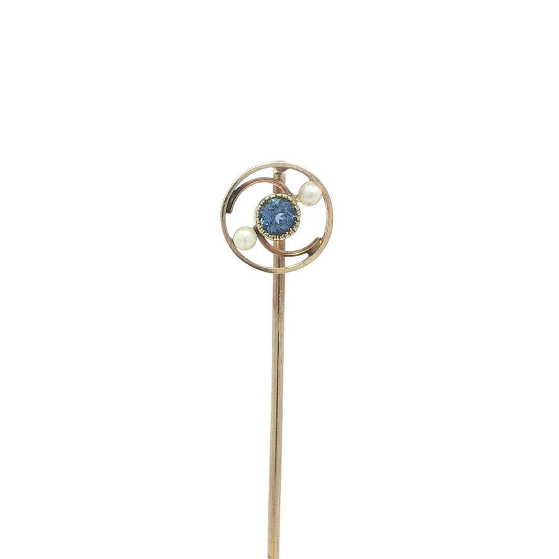 Art Nouveau 14k Yellow Gold Stick Pin with Montana Sapphire and Seed Pearls: Art Nouveau 14k Yellow Gold Stick Pin with Montana Sapphire and Seed Pearls This antique Art Nouveau stick pin features a petite circular design crafted in solid 13-14k yellow gold. It is set with a n