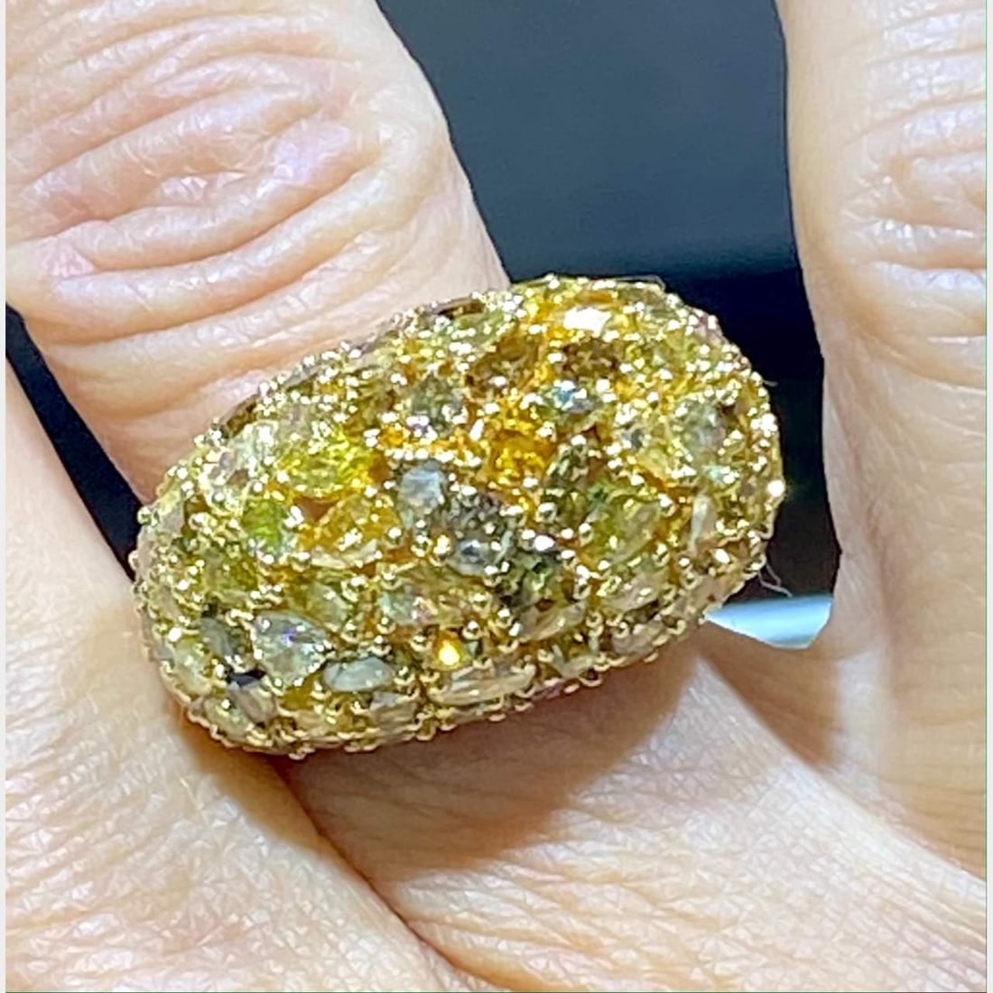 18K White Gold Fancy Diamond Ring 10.53 Ct Fancy Yellow Diamonds: 18K White Gold Fancy Diamond Ring 10.53 Ct Fancy Yellow Diamonds This exquisite 18K White Gold Fancy Diamond Ring showcases a stunning combination of 10.53 Ct. of Fancy Yellow Diamonds, complemented b