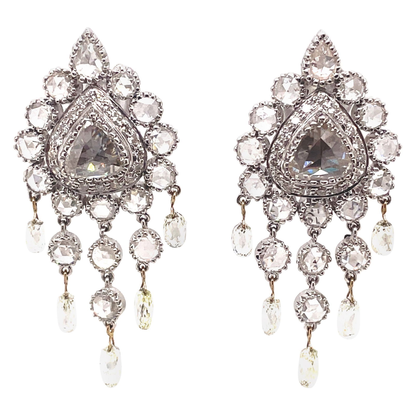 Victorian 11.35ct Rose Cut Diamond Chandelier Earrings in 18k White Gold: Victorian 11.35ct Rose Cut Diamond Chandelier Earrings in 18k White Gold Make a statement with these stunning chandelier earrings featuring a total of 11.35 carats of exquisite rose cut, briolette, an
