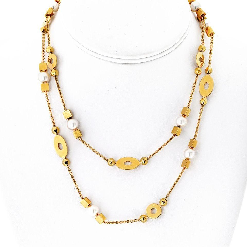 Bvlgari Lycea 18K Yellow Gold Pearl Necklace 33 Inches: Bvlgari Lycea 18K Yellow Gold Pearl Necklace 33 Inches This exquisite Bvlgari Lycea necklace showcases a stunning design crafted from rich 18K yellow gold. Measuring 33 inches in length, the necklace