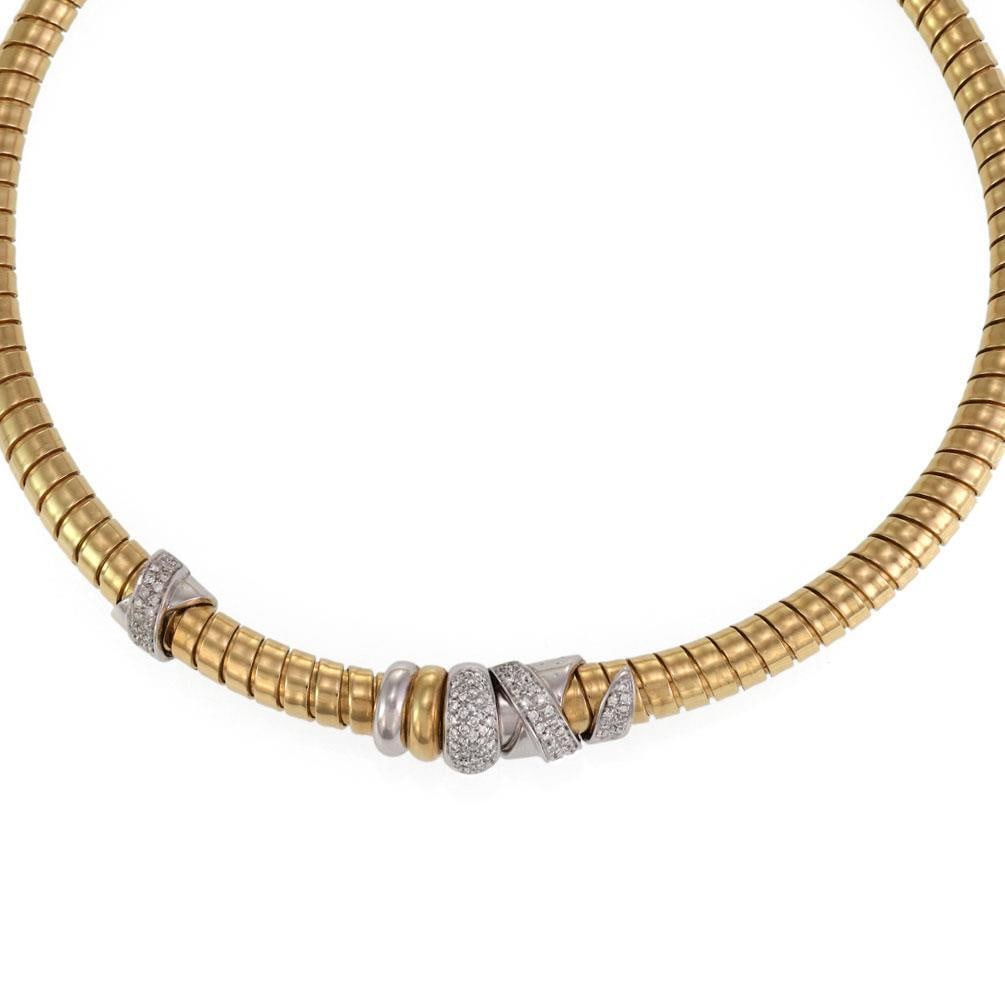 Nouvelle Bague 1.00ct Diamond 18k Gold Tubogas Spiral Necklace: Nouvelle Bague 1.00ct Diamond 18k Gold Tubogas Spiral Necklace Discover the exquisite craftsmanship of this authentic Nouvelle Bague necklace, designed from luxurious 18k yellow and white gold. The ne