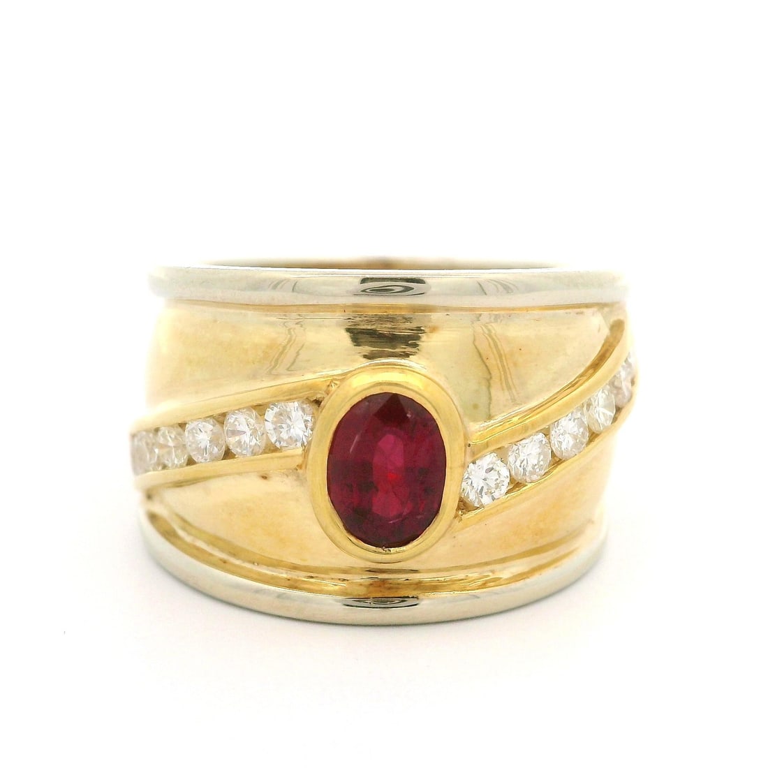 18k Two Tone Gold Ruby Diamond Cigar Cocktail Band Ring 1.60ctw: 18k Two Tone Gold Ruby Diamond Cigar Cocktail Band Ring 1.60ctw This stunning wide domed bombe cigar cocktail band ring features a captivating design crafted from 18k solid yellow and white gold. The
