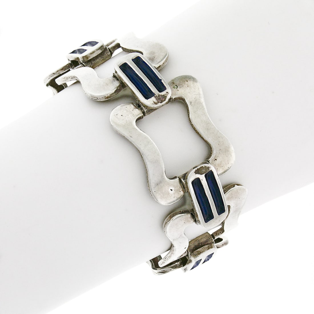 Vintage .800 Sterling Silver 8 Inch Wide Link Bracelet with Blue Enamel: Vintage .800 Sterling Silver 8 Inch Wide Link Bracelet with Blue Enamel This vintage bracelet is a stunning piece crafted from .800 sterling silver, featuring a unique design with large, wide open lin