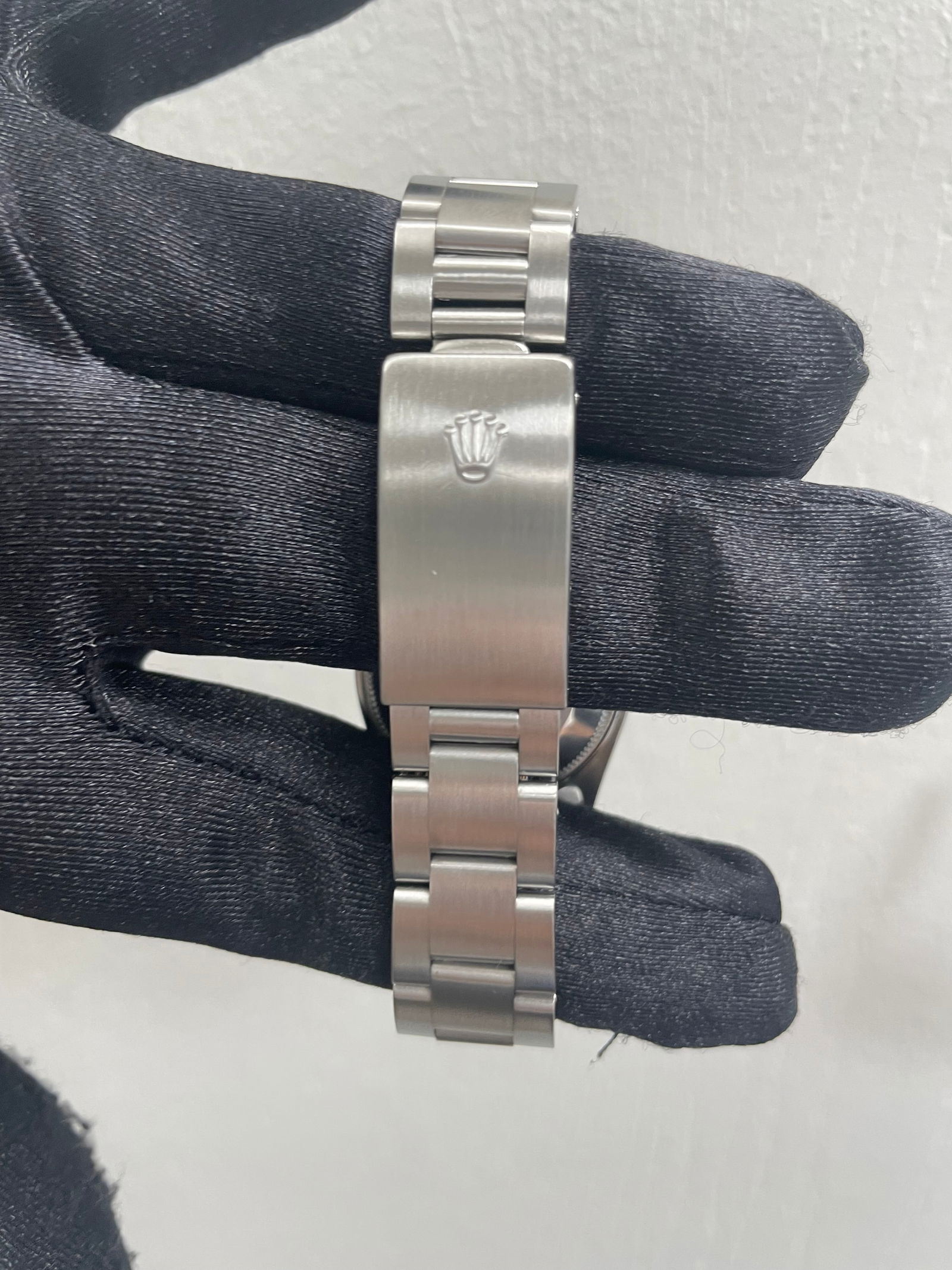 Ladies Oyster Perpetual Ref 67480 with Aftermarket Lavender Dial and Oyster Bracelet: Ladies Oyster Perpetual Ref 67480 with Aftermarket Lavender Dial and Oyster Bracelet This ladies Rolex Oyster Perpetual features an Aftermarket lavender dial and a smooth bezel, complemented by an Oys