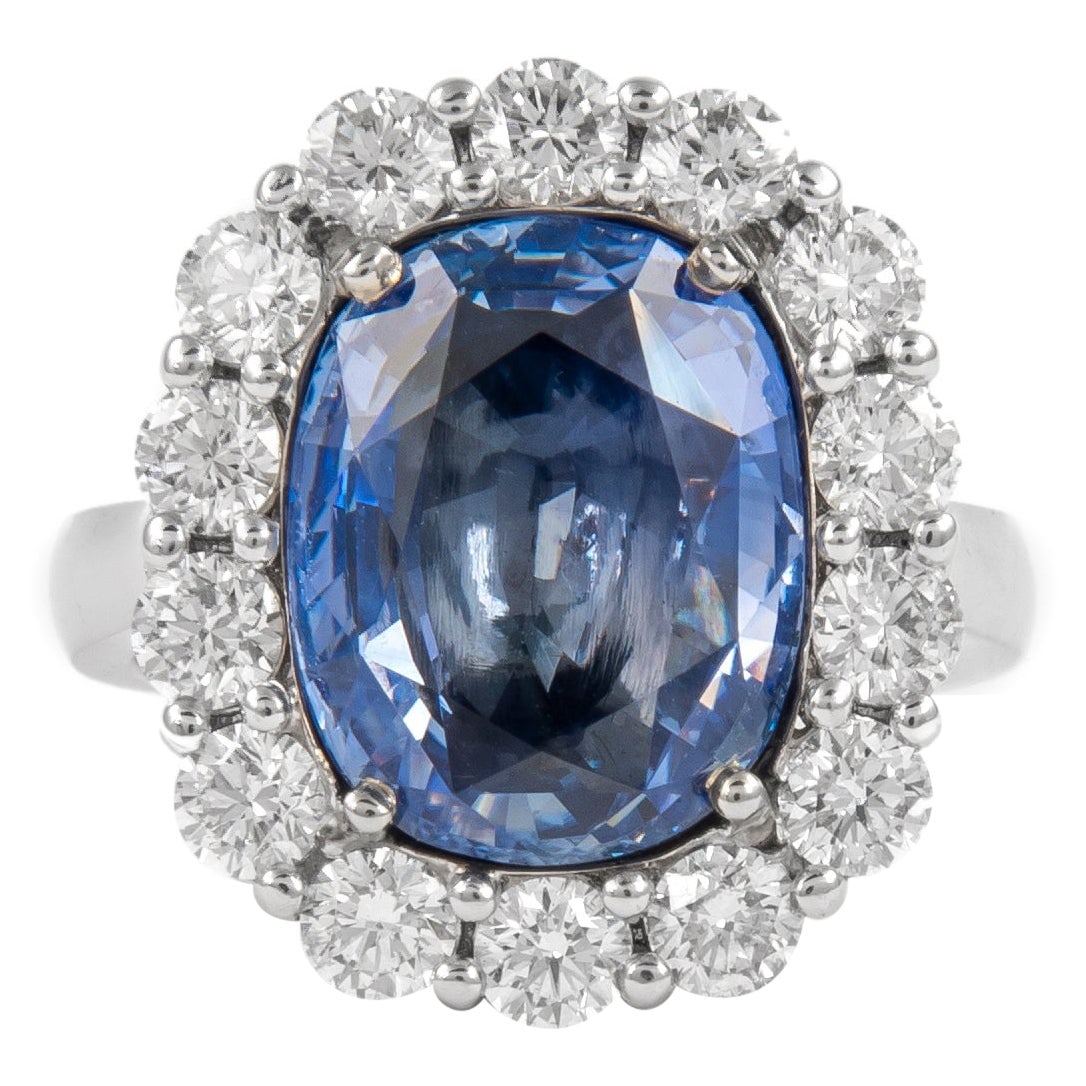 GIA 7.60ct No Heat Ceylon Sapphire Diamond Ring 18k White Gold: GIA 7.60ct No Heat Ceylon Sapphire Diamond Ring 18k White Gold This exquisite ring features a stunning 7.60 carat unheated Ceylon sapphire, accompanied by a dazzling halo of 14 round brilliant diamond