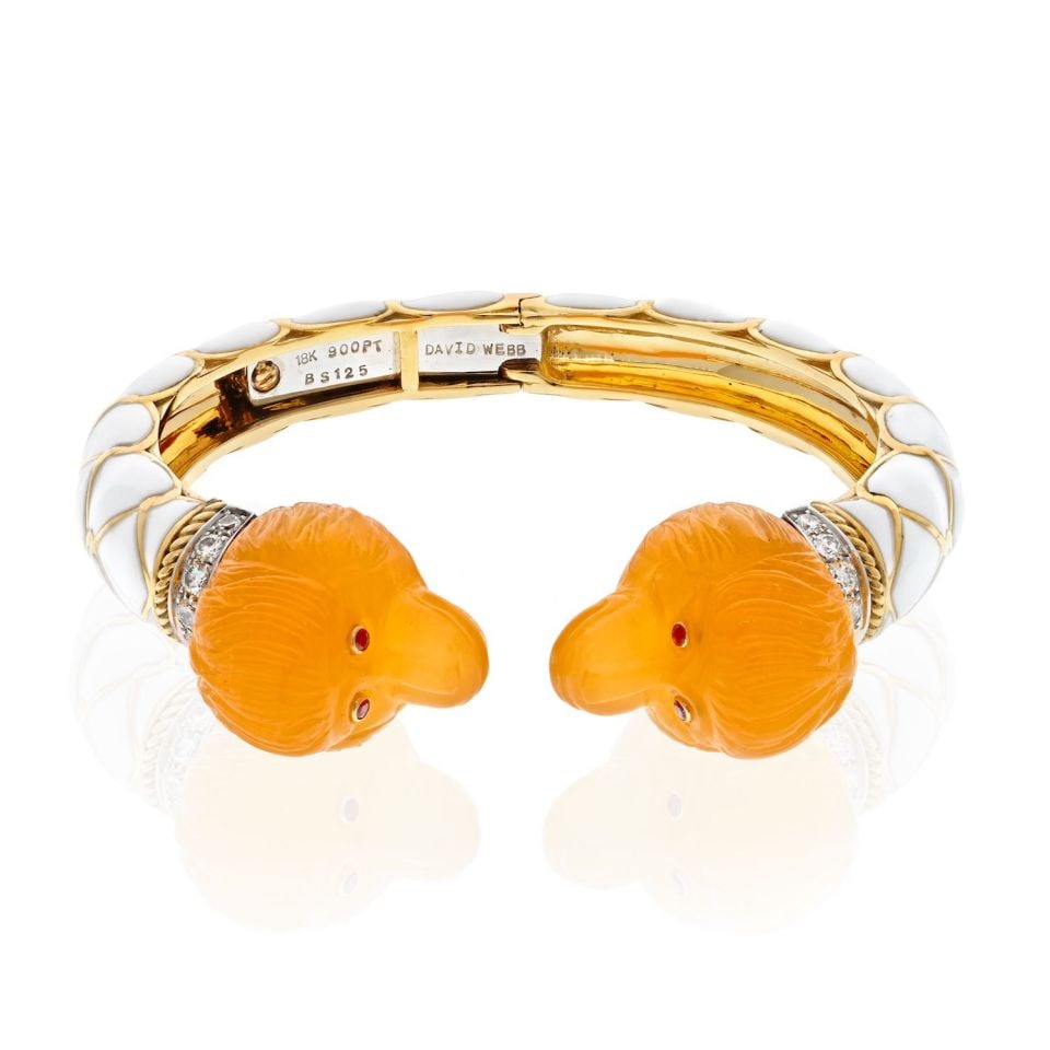 David Webb 1975 Platinum 18K Gold Carnelian Monkey Bracelet: David Webb 1975 Platinum 18K Gold Carnelian Monkey Bracelet Discover the captivating elegance of this David Webb bracelet, a timeless piece expertly crafted in 1975. This exquisite bracelet features a