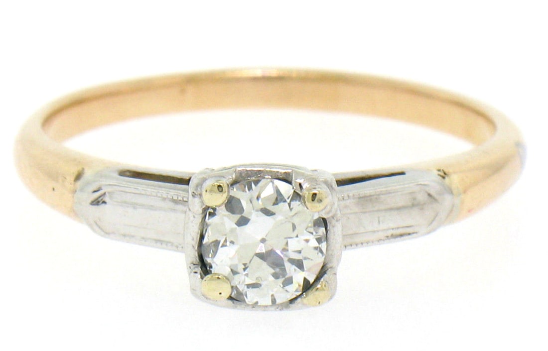 Vintage 14k Two Tone Gold G VS2 Diamond Solitaire Engagement Ring: Vintage 14k Two Tone Gold G VS2 Diamond Solitaire Engagement Ring This exquisite vintage engagement ring features a stunning 14k two-tone gold design, expertly crafted from solid yellow and white gold