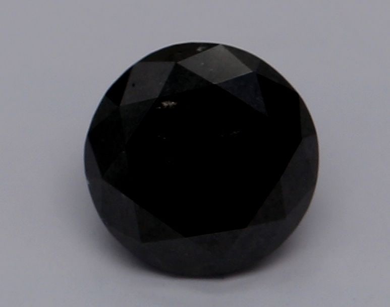 Loose Diamond - ROUND 0.74ct Fancy Black VVS2: Loose Diamond - ROUND 0.74ct Fancy Black VVS2 Source: Natural Shape: ROUND Carats: 0.74 Color: Fancy Black Certification: GIA Video: