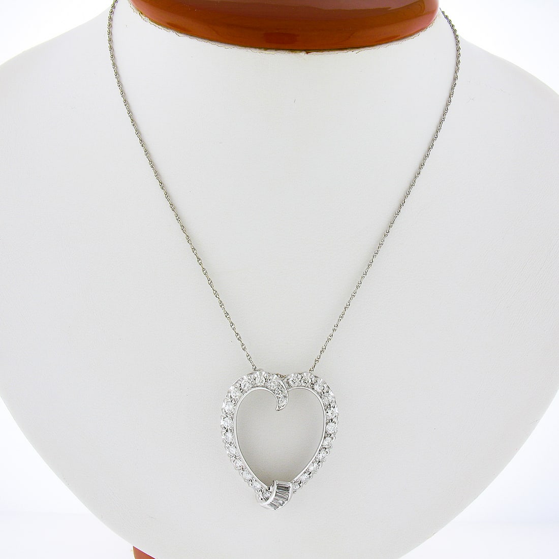 Vintage 14K White Gold 1.26ct Diamond Heart Pendant with Chain: Vintage 14K White Gold 1.26ct Diamond Heart Pendant with Chain This exquisite vintage pendant showcases a large open heart design crafted from solid 14K white gold. Adorned with approximately 1.26 car