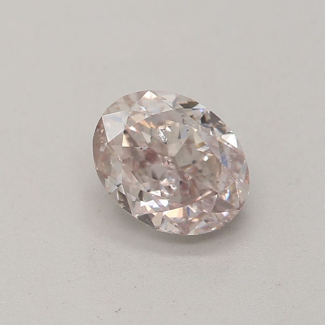 Loose Diamond - OVAL 0.7ct Fancy Pinkish Brown SI2: Loose Diamond - OVAL 0.7ct Fancy Pinkish Brown SI2 Source: Natural Shape: OVAL Carats: 0.7 Color: Fancy Pinkish Brown Certification: GIA Video: