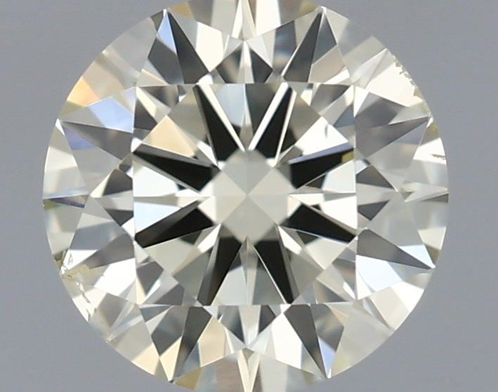Loose Diamond - ROUND 0.59ct O-P SI1: Loose Diamond - ROUND 0.59ct O-P SI1 Source: Natural Shape: ROUND Carats: 0.59 Color: O-P Certification: IGI Video: