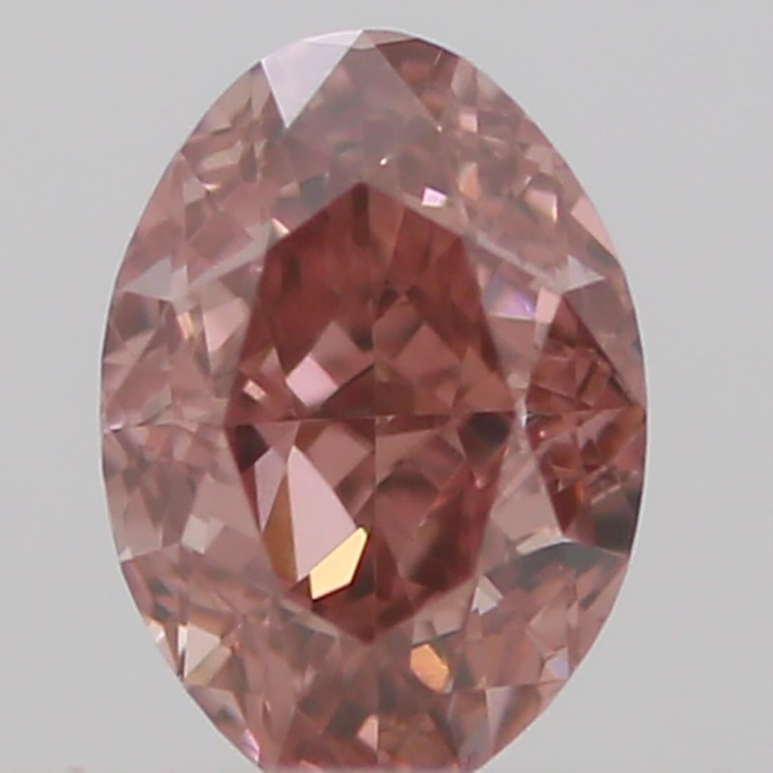 Loose Diamond - OVAL 0.15ct Fancy Intense Orangey Pink VS2: Loose Diamond - OVAL 0.15ct Fancy Intense Orangey Pink VS2 Source: Natural Shape: OVAL Carats: 0.15 Color: Fancy Intense Orangey Pink Certification: GIA Video: