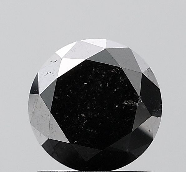 Loose Diamond - ROUND 1.63ct Fancy Black VS2: Loose Diamond - ROUND 1.63ct Fancy Black VS2 Source: Natural Shape: ROUND Carats: 1.63 Color: Fancy Black Certification: NONE Video: