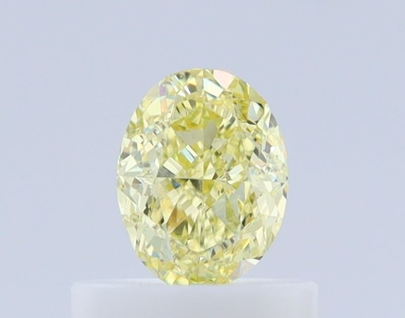 Loose Diamond - OVAL 0.54ct Fancy Yellow VS1: Loose Diamond - OVAL 0.54ct Fancy Yellow VS1 Source: Natural Shape: OVAL Carats: 0.54 Color: Fancy Yellow Certification: GIA Video: