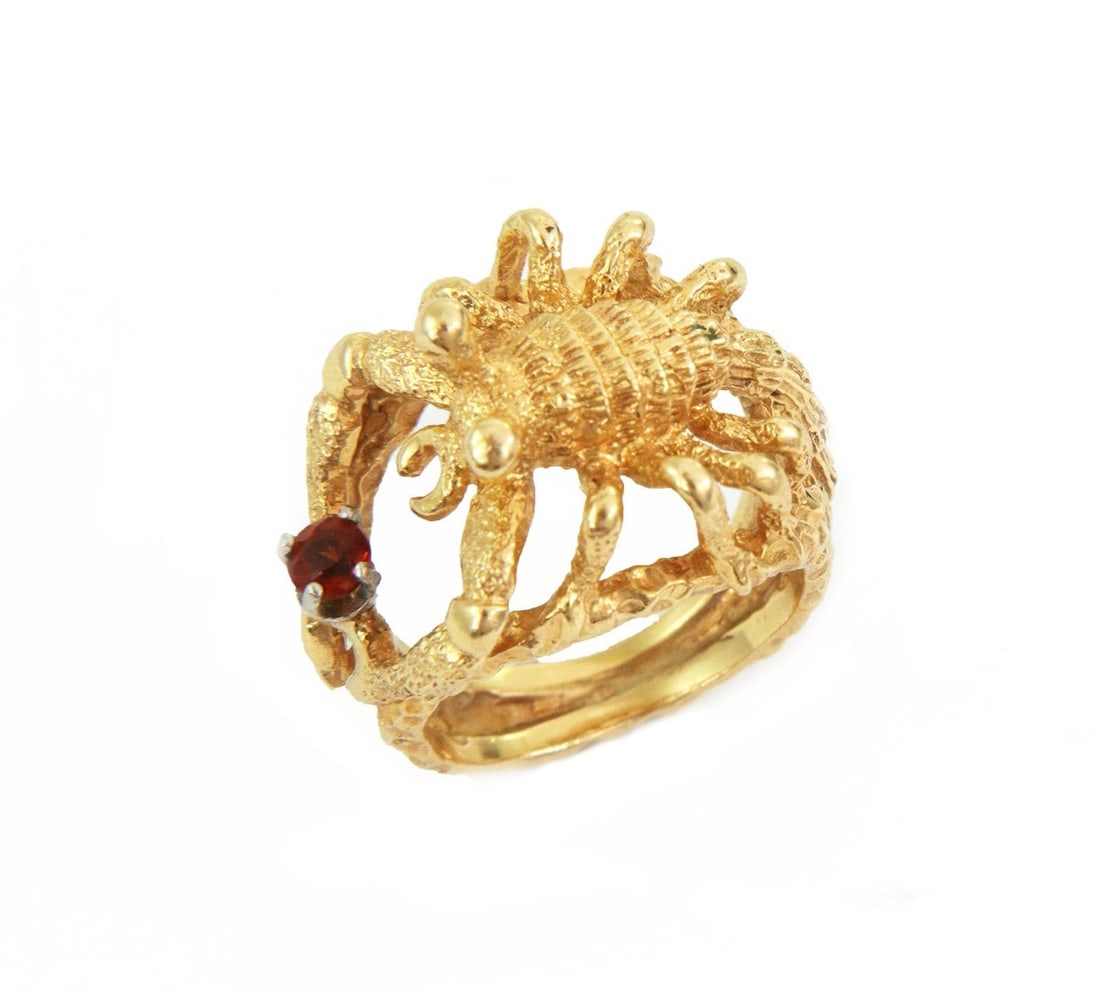 Vintage 14k Yellow Gold 3D Scorpion Ring with Garnet: Vintage 14k Yellow Gold 3D Scorpion Ring with Garnet Discover this vintage 14k yellow gold ring featuring an intricately designed 3D scorpion, showcasing a stunning round cut garnet nestled in its fro