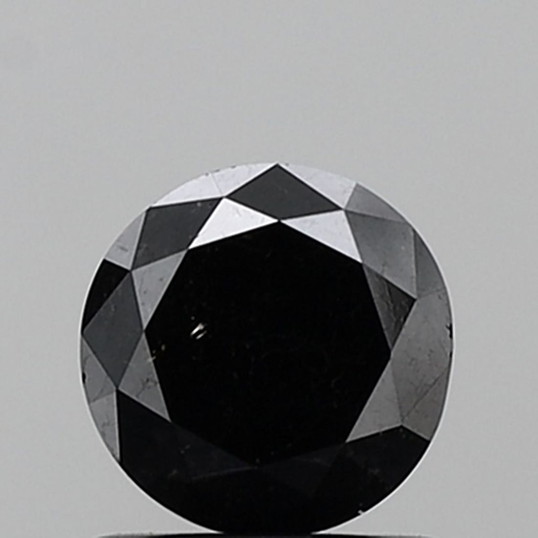 Loose Diamond - ROUND 1.26ct Fancy Black VS2: Loose Diamond - ROUND 1.26ct Fancy Black VS2 Source: Natural Shape: ROUND Carats: 1.26 Color: Fancy Black Certification: NONE Video:
