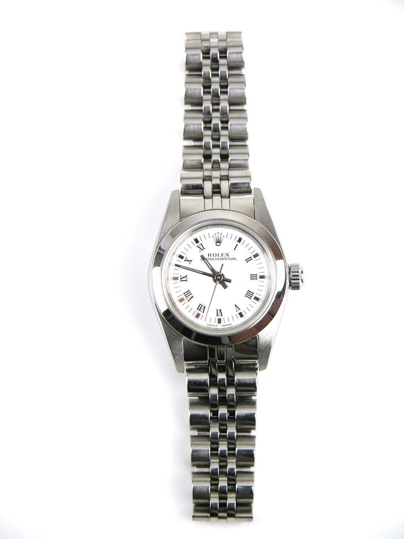 Ladies Oyster Perpetual Watch White Dial Jubilee Bracelet Ref 76080: Ladies Oyster Perpetual Watch White Dial Jubilee Bracelet Ref 76080 This Rolex Oyster Perpetual features a white dial and a smooth bezel, complemented by a Jubilee bracelet. Designed for ladies, this