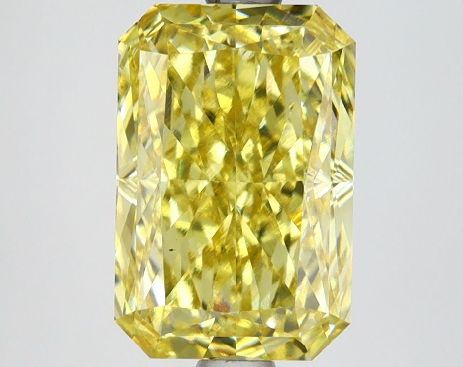 Loose Diamond - RADIANT 2.75ct Fancy Vivid Yellow VS1: Loose Diamond - RADIANT 2.75ct Fancy Vivid Yellow VS1 Source: This is a real non-mined Diamond that has been grown in a lab Shape: RADIANT Carats: 2.75 Color: Fancy Vivid Yellow Certification: IGI Vid