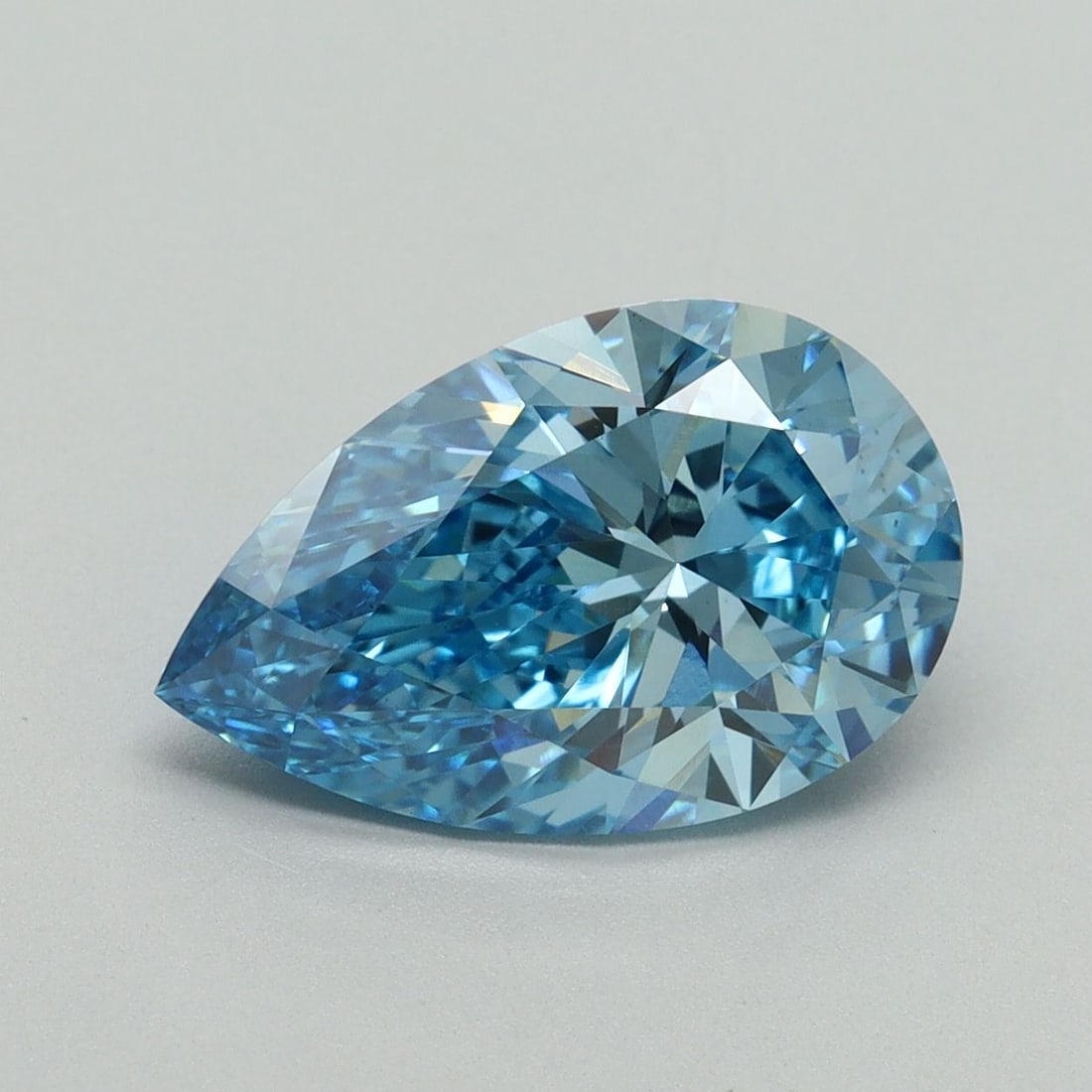 Loose Diamond - PEAR 3.01ct Fancy Vivid Blue VS1: Loose Diamond - PEAR 3.01ct Fancy Vivid Blue VS1 Source: This is a real non-mined Diamond that has been grown in a lab Shape: PEAR Carats: 3.01 Color: Fancy Vivid Blue Certification: IGI Video:
