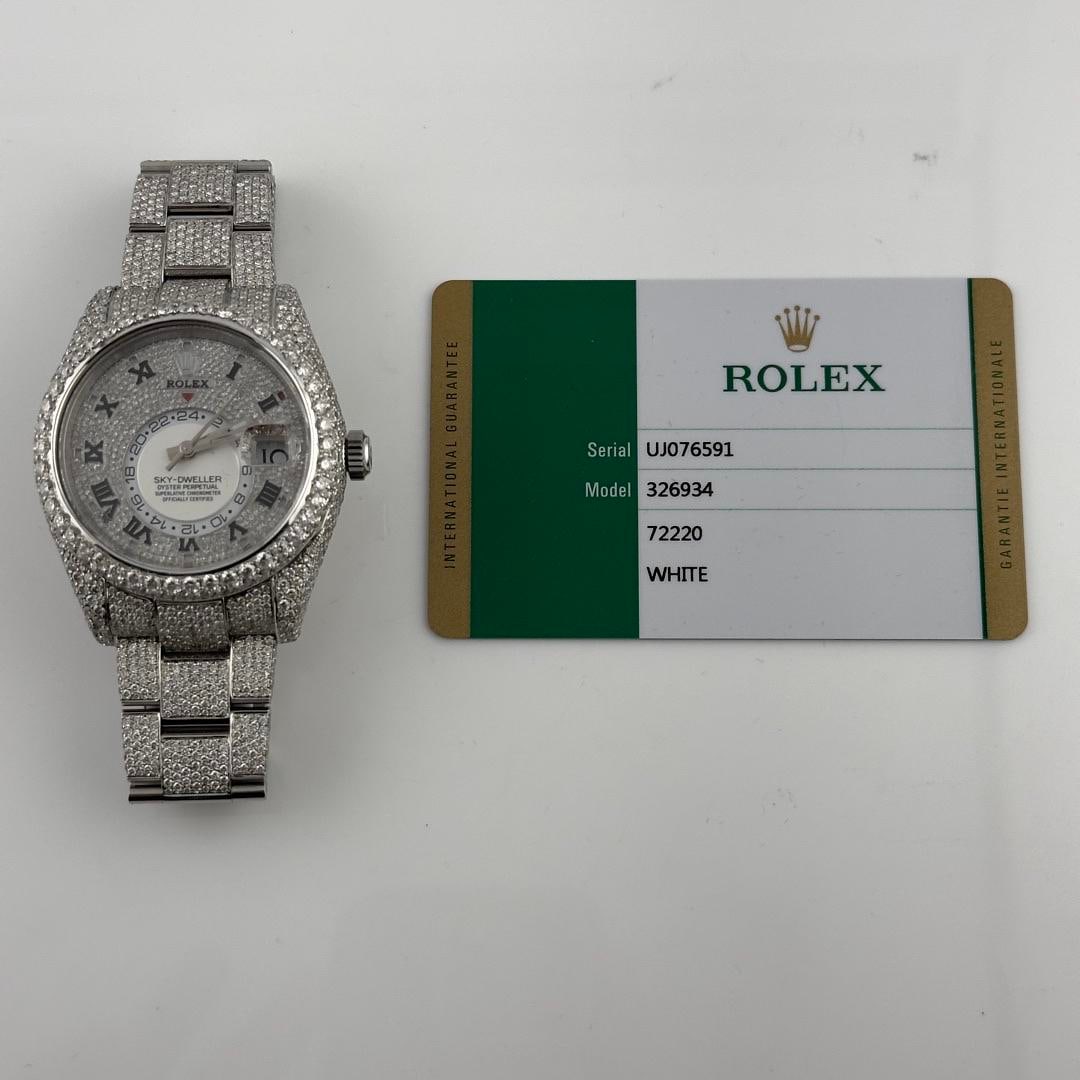 Rolex Sky Dweller 326934 Oyster Bracelet Diamond Roman Dial 2018 Card: Rolex Sky Dweller 326934 Oyster Bracelet Diamond Roman Dial 2018 Card This Rolex Sky-Dweller features a diamond Roman numeral dial and a diamond bezel, paired with an Oyster bracelet. The watch is a m