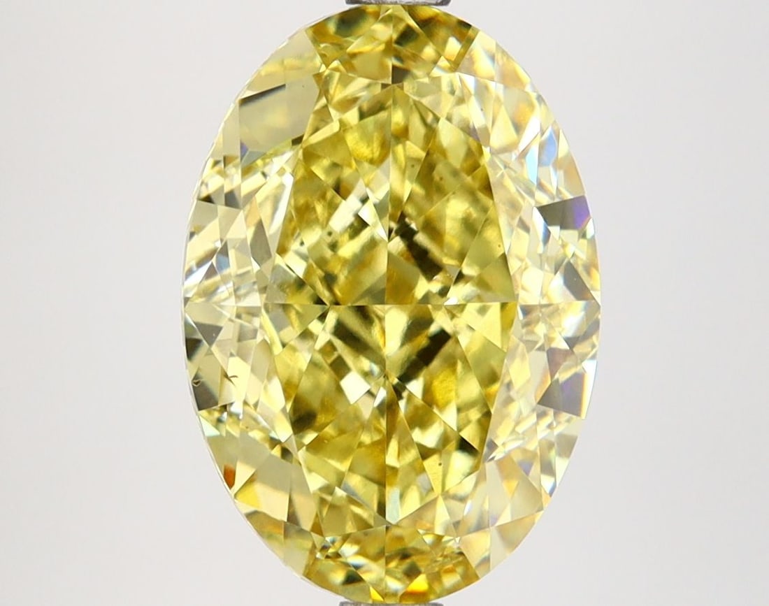 Loose Diamond - OVAL 4.76ct Fancy Vivid Yellow VVS2: Loose Diamond - OVAL 4.76ct Fancy Vivid Yellow VVS2 Source: This is a real non-mined Diamond that has been grown in a lab Shape: OVAL Carats: 4.76 Color: Fancy Vivid Yellow Certification: IGI Video: