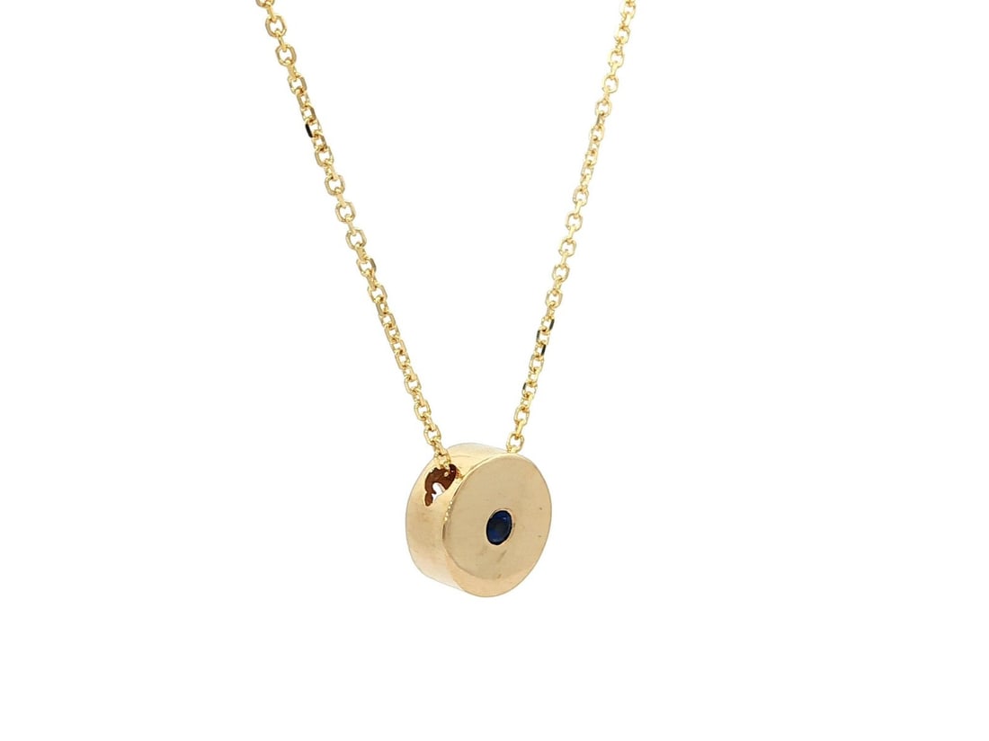 14k Yellow Gold Natural Blue Sapphire Circle Slide Pendant Necklace: 14k Yellow Gold Natural Blue Sapphire Circle Slide Pendant Necklace This exquisite pendant necklace features a stunning round disk design crafted from solid 14k yellow gold. At its center lies a natur