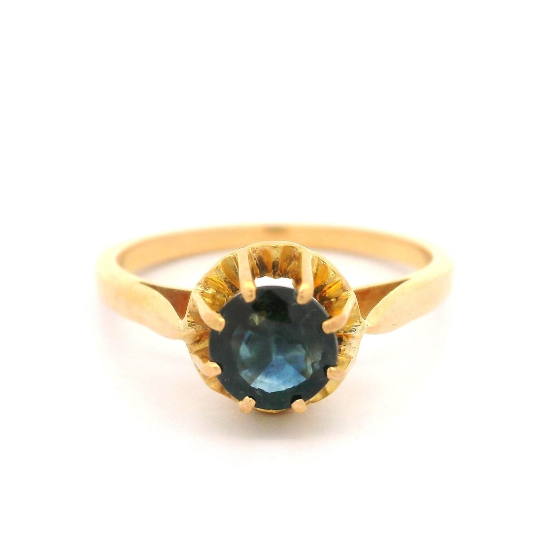 Vintage 18K Yellow Gold Sapphire Solitaire Ring with French Hallmark: Vintage 18K Yellow Gold Sapphire Solitaire Ring with French Hallmark This exquisite vintage solitaire ring features a stunning natural genuine sapphire in an old mine cut, showcasing a deep blue color
