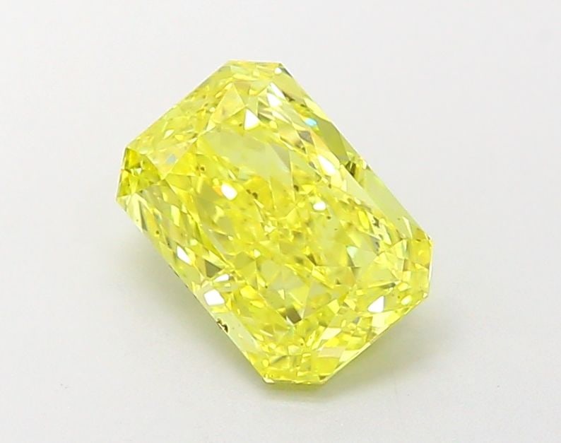 Loose Diamond - RADIANT 1.43ct Fancy Vivid Yellow VVS2: Loose Diamond - RADIANT 1.43ct Fancy Vivid Yellow VVS2 Source: This is a real non-mined Diamond that has been grown in a lab Shape: RADIANT Carats: 1.43 Color: Fancy Vivid Yellow Certification: IGI Vi