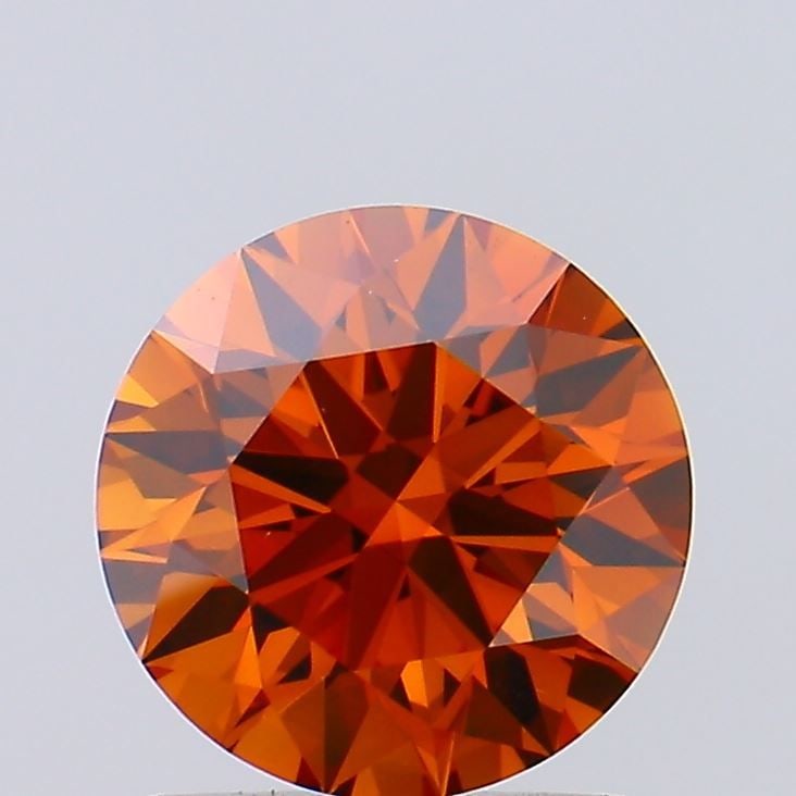 Loose Diamond - ROUND 1.03ct Fancy Vivid Red VS1: Loose Diamond - ROUND 1.03ct Fancy Vivid Red VS1 Source: This is a real non-mined Diamond that has been grown in a lab Shape: ROUND Carats: 1.03 Color: Fancy Vivid Red Certification: NONE Video: