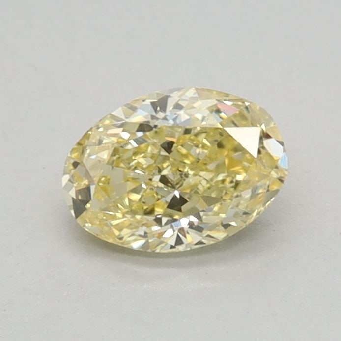 Loose Diamond - OVAL 0.38ct Fancy Intense Yellow VS1: Loose Diamond - OVAL 0.38ct Fancy Intense Yellow VS1 Source: This is a real non-mined Diamond that has been grown in a lab Shape: OVAL Carats: 0.38 Color: Fancy Intense Yellow Certification: IGI Video