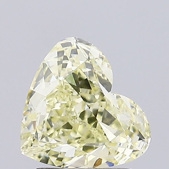 Loose Diamond - HEART 1.7ct Fancy Yellow VS1: Loose Diamond - HEART 1.7ct Fancy Yellow VS1 Source: This is a real non-mined Diamond that has been grown in a lab Shape: HEART Carats: 1.7 Color: Fancy Yellow Certification: IGI Video: