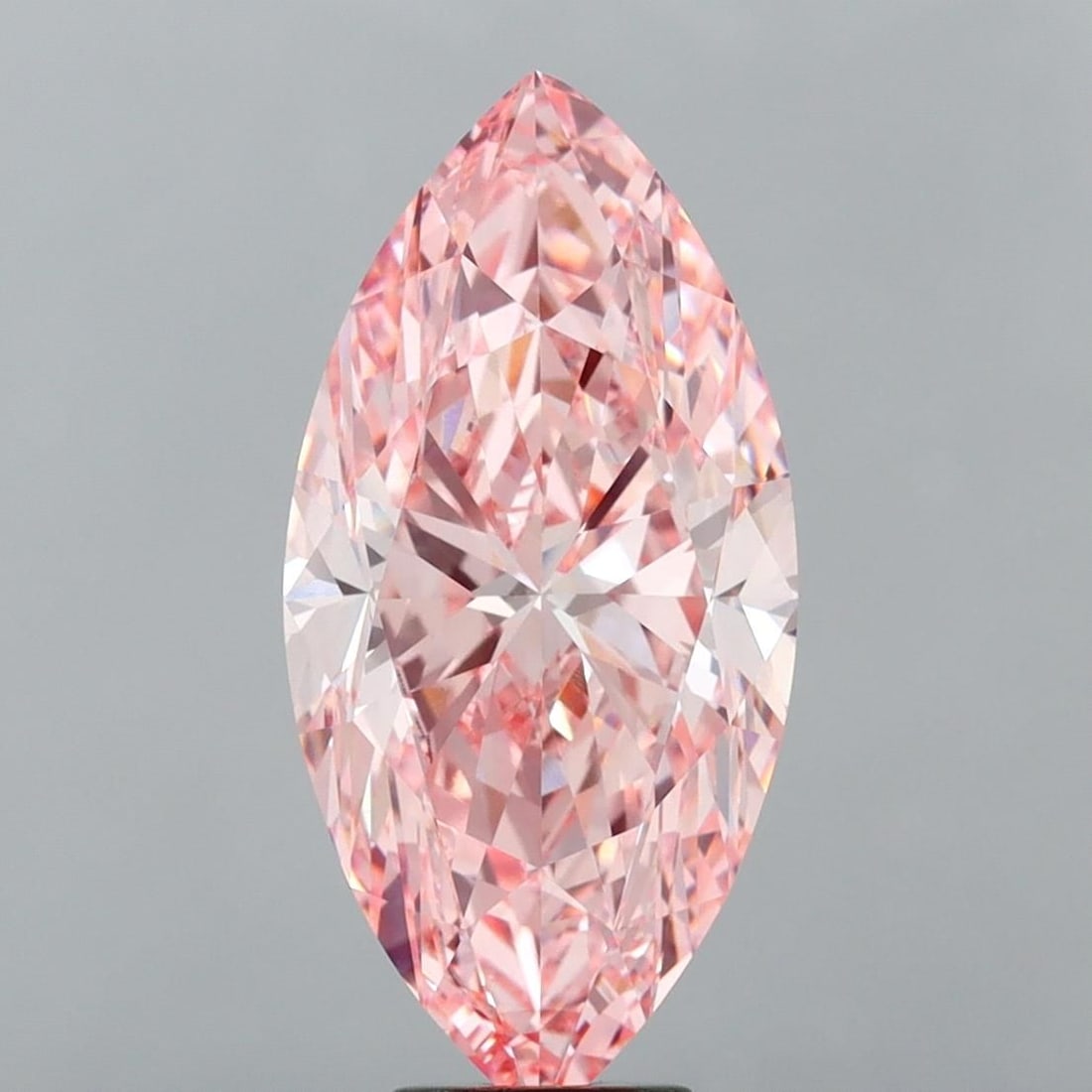Loose Diamond - MARQUISE 10.05ct Fancy Vivid Pink VVS2: Loose Diamond - MARQUISE 10.05ct Fancy Vivid Pink VVS2 Source: This is a real non-mined Diamond that has been grown in a lab Shape: MARQUISE Carats: 10.05 Color: Fancy Vivid Pink Certification: IGI Vi