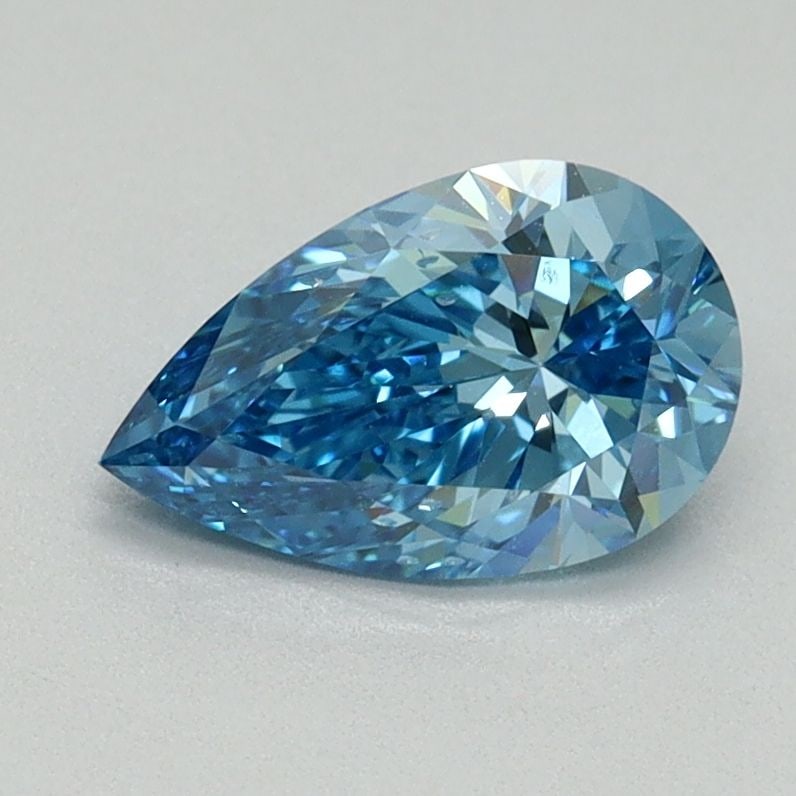 Loose Diamond - PEAR 1.0ct Fancy Vivid Blue SI1: Loose Diamond - PEAR 1.0ct Fancy Vivid Blue SI1 Source: This is a real non-mined Diamond that has been grown in a lab Shape: PEAR Carats: 1.0 Color: Fancy Vivid Blue Certification: IGI Video: