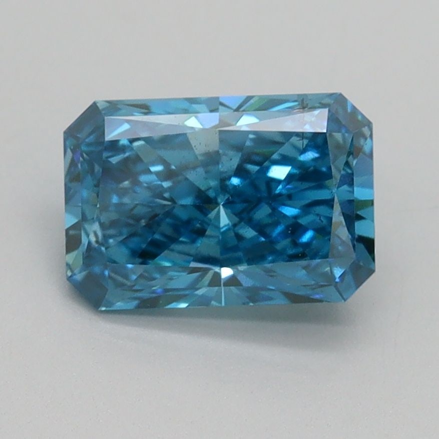 Loose Diamond - RADIANT 1.5ct Fancy Vivid Blue SI1: Loose Diamond - RADIANT 1.5ct Fancy Vivid Blue SI1 Source: This is a real non-mined Diamond that has been grown in a lab Shape: RADIANT Carats: 1.5 Color: Fancy Vivid Blue Certification: IGI Video: