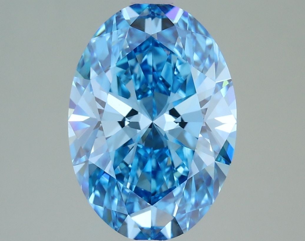 Loose Diamond - OVAL 2.43ct Fancy Vivid Blue VVS2: Loose Diamond - OVAL 2.43ct Fancy Vivid Blue VVS2 Source: This is a real non-mined Diamond that has been grown in a lab Shape: OVAL Carats: 2.43 Color: Fancy Vivid Blue Certification: IGI Video: