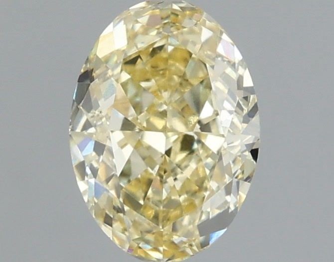 Loose Diamond - OVAL 1.01ct Fancy Yellow VS1: Loose Diamond - OVAL 1.01ct Fancy Yellow VS1 Source: This is a real non-mined Diamond that has been grown in a lab Shape: OVAL Carats: 1.01 Color: Fancy Yellow Certification: IGI Video: