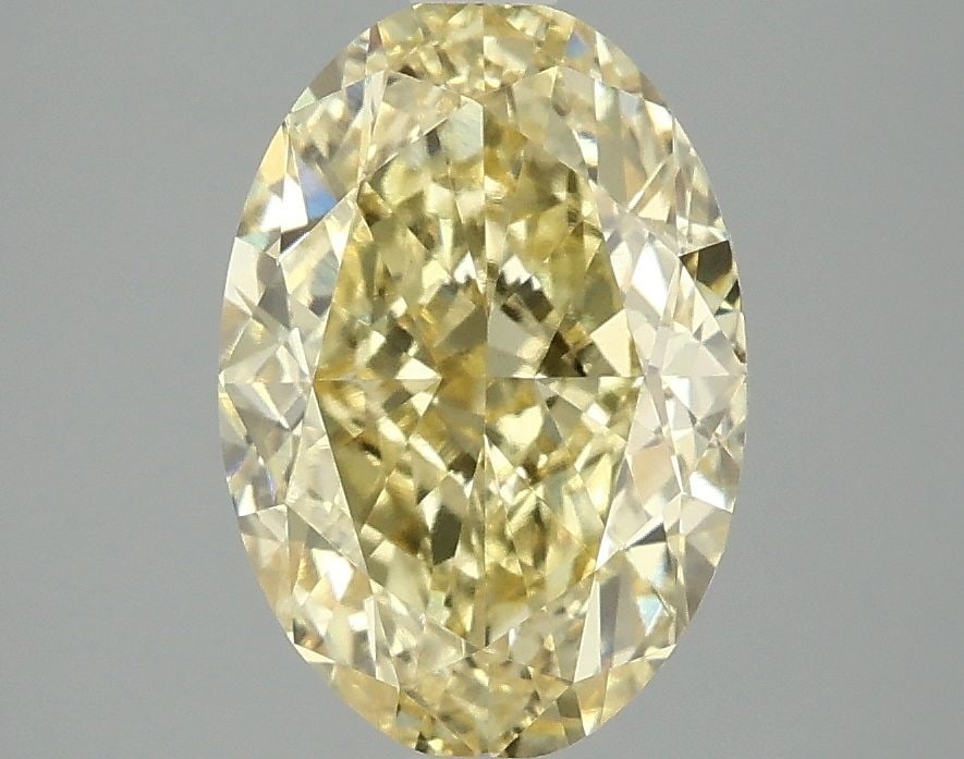 Loose Diamond - OVAL 3.03ct Fancy Intense Yellow VVS2: Loose Diamond - OVAL 3.03ct Fancy Intense Yellow VVS2 Source: This is a real non-mined Diamond that has been grown in a lab Shape: OVAL Carats: 3.03 Color: Fancy Intense Yellow Certification: IGI Vide