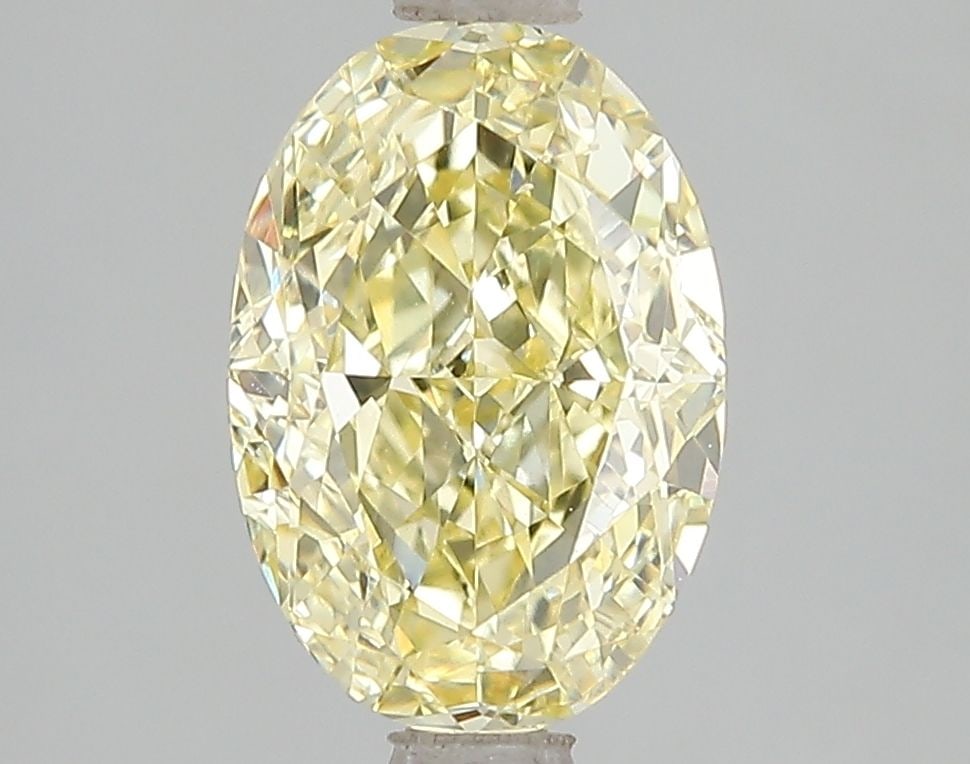 Loose Diamond - OVAL 2.5ct Fancy Vivid Yellow VS2: Loose Diamond - OVAL 2.5ct Fancy Vivid Yellow VS2 Source: This is a real non-mined Diamond that has been grown in a lab Shape: OVAL Carats: 2.5 Color: Fancy Vivid Yellow Certification: IGI Video: