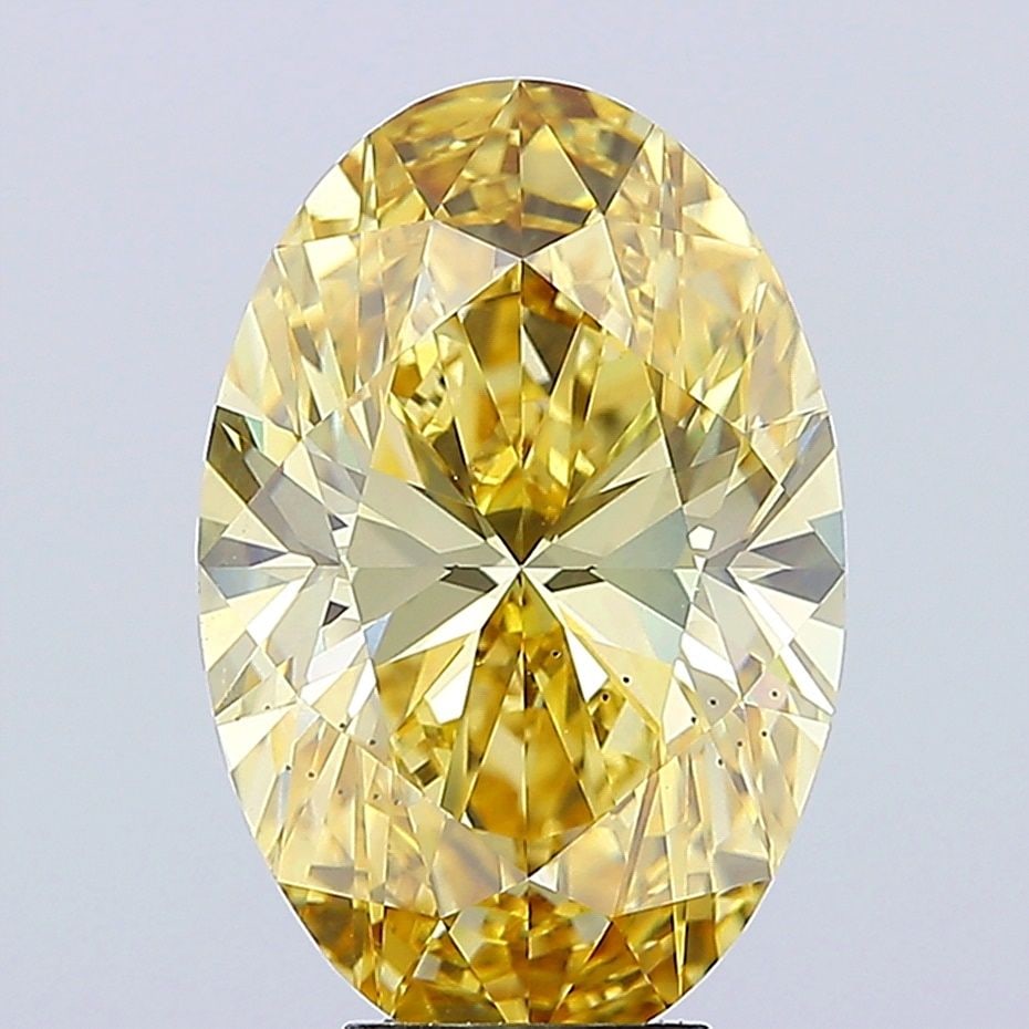 Loose Diamond - OVAL 7.04ct Fancy Intense Yellow VS2: Loose Diamond - OVAL 7.04ct Fancy Intense Yellow VS2 Source: This is a real non-mined Diamond that has been grown in a lab Shape: OVAL Carats: 7.04 Color: Fancy Intense Yellow Certification: IGI Video