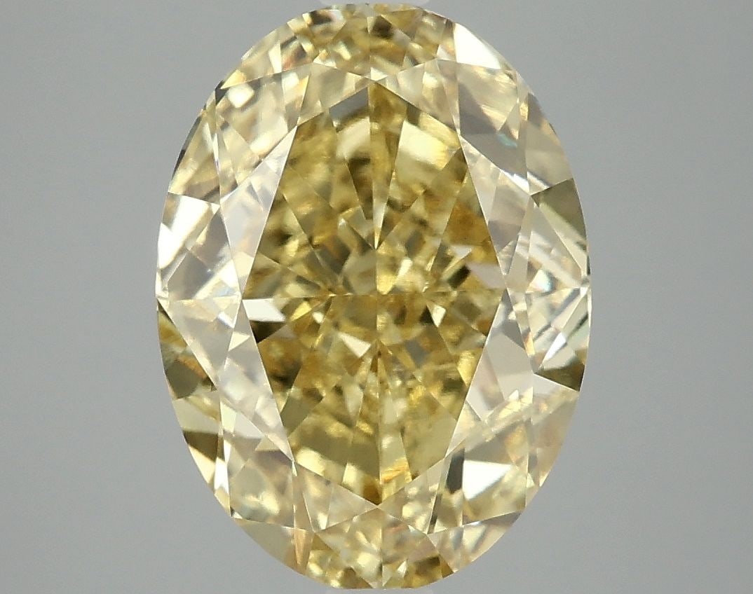 Loose Diamond - OVAL 5.08ct Fancy Vivid Yellow VS1: Loose Diamond - OVAL 5.08ct Fancy Vivid Yellow VS1 Source: This is a real non-mined Diamond that has been grown in a lab Shape: OVAL Carats: 5.08 Color: Fancy Vivid Yellow Certification: IGI Video: